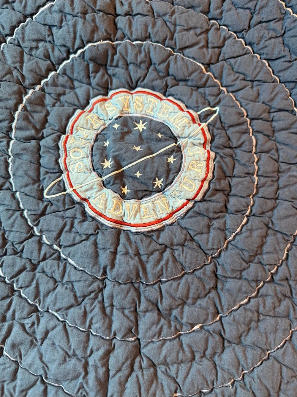 Land Of Nod Navy Quilted Mat with Orange Border